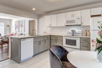 Modern white appliance package, including microwave & dishwasher